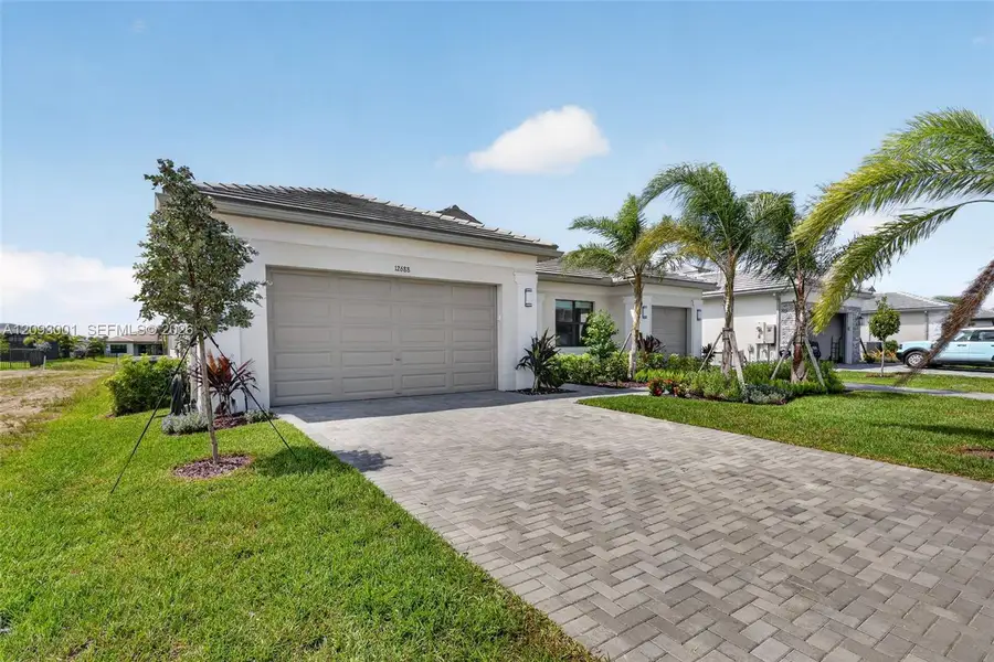 Front exterior of a new home in , Port St. Lucie, FL, highlighting curb appeal (Image 1). Front exterior of a new home in , Port St. Lucie, FL, highlighting curb appeal (Image 1).