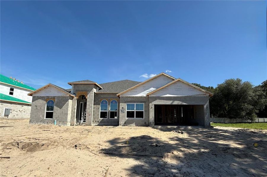 Front exterior of a new home in Willow Run, Apopka, FL, highlighting curb appeal (Image 2). Front exterior of a new home in Willow Run, Apopka, FL, highlighting curb appeal (Image 2).