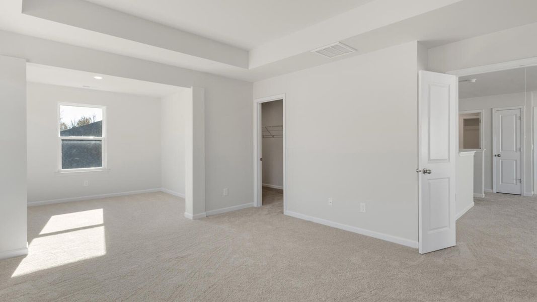 Representative unfurnished interior of a home built from the HARBOR OAK by D.R. Horton in Indigo Preserve, Leland (Image 37).