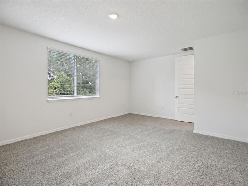 Spacious, unfurnished interior of a new home in Salt Meadows - Signature Series, Parrish (Image 39). Spacious, unfurnished interior of a new home in Salt Meadows - Signature Series, Parrish (Image 39).