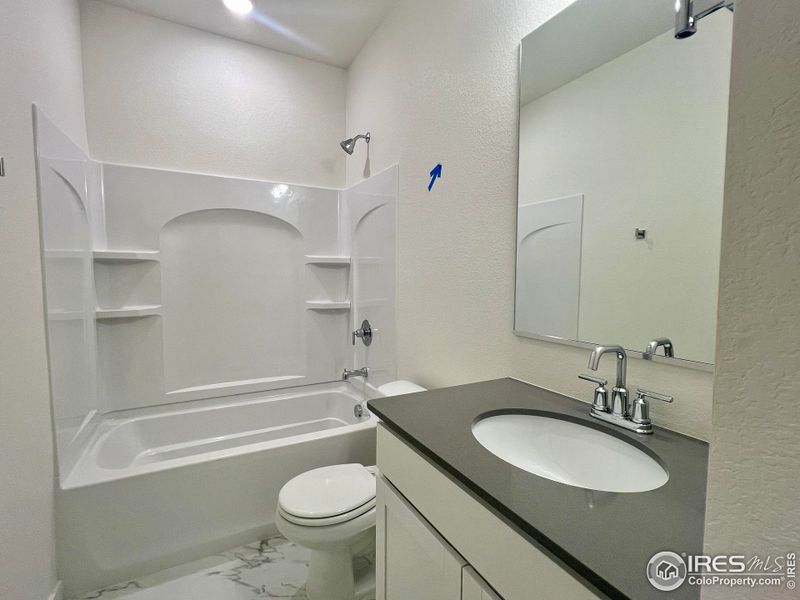 Furnished interior view inside a new home in Union Colony West, Greeley (Image 8).