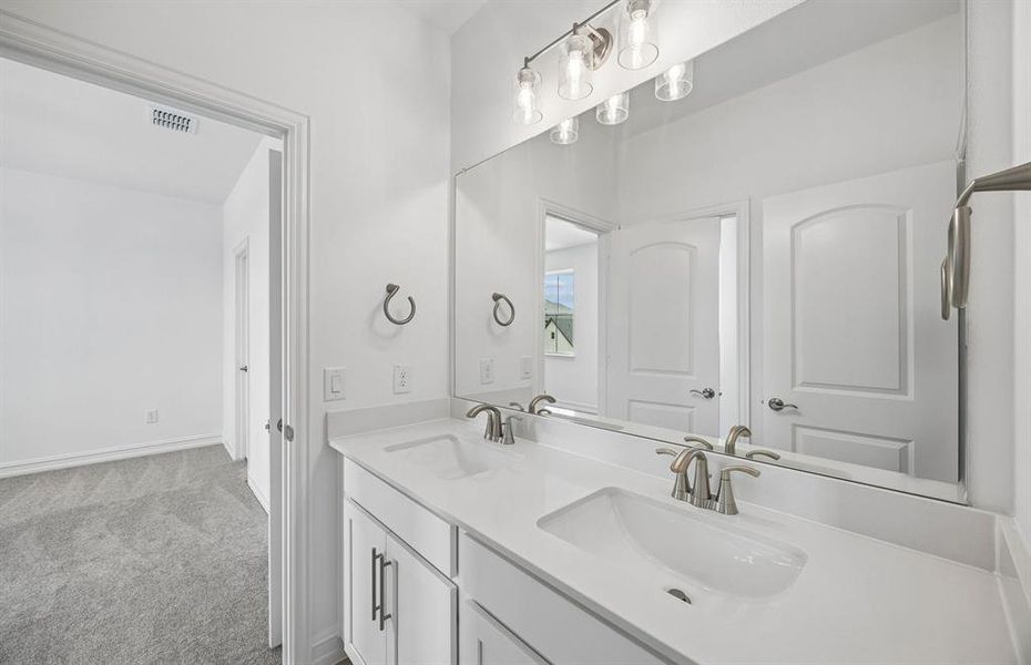 Secondary bath with double vanities