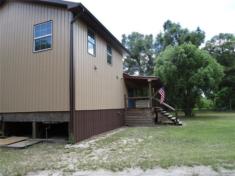 Exterior details and patio area of a home in , Dade City (Image 9).
