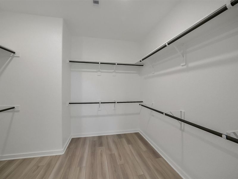 Spacious, unfurnished interior of a new home in Sunterra, Katy (Image 35).