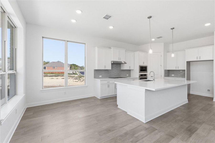 Furnished interior view inside a new home in Retreat at San Gabriel, Georgetown (Image 7).