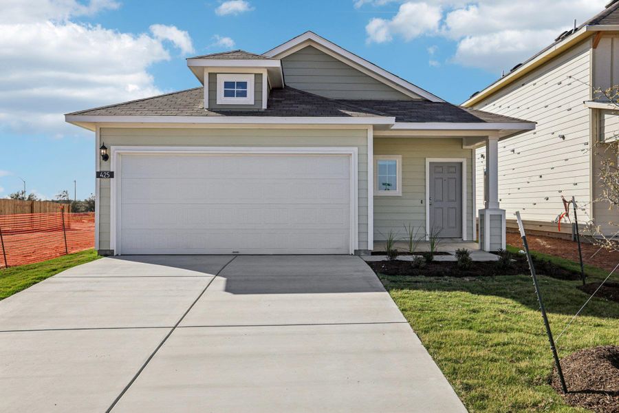 Front exterior of a new home in Cascade, Liberty Hill, TX, highlighting curb appeal (Image 17).