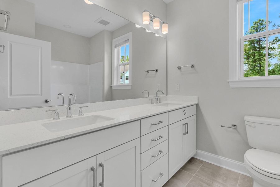 Furnished interior view inside a new home in Tidewater at Lakes of Cane Bay, Summerville (Image 9).