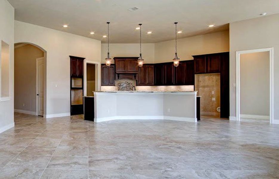 Representative furnished interior of a home built from the 3326 by Ravenna Homes in The Woodlands Hills 65′, Willis (Image 8).