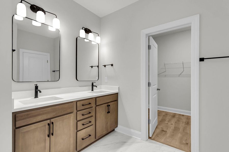 Furnished interior view inside a new home in Tidewater at Lakes of Cane Bay, Summerville (Image 10).