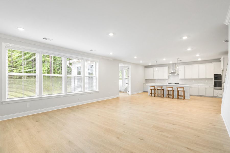 Spacious, unfurnished interior of a new home in Tidewater at Lakes of Cane Bay, Summerville (Image 48).