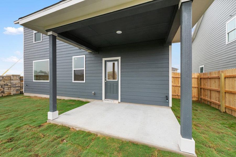 Exterior details and patio area of a home in Covered Bridge, Hutto (Image 28).