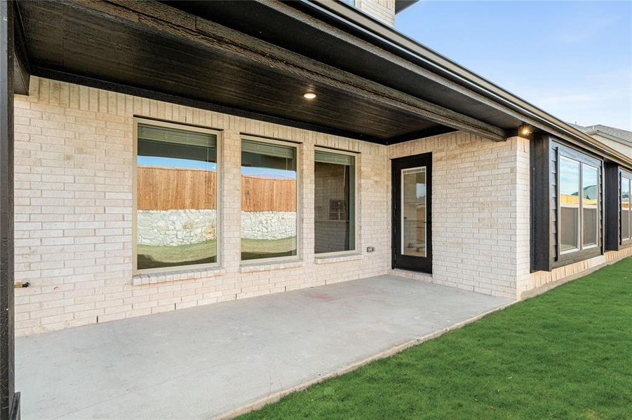 Exterior details and patio area of a home in Sutton Fields, Celina (Image 27).