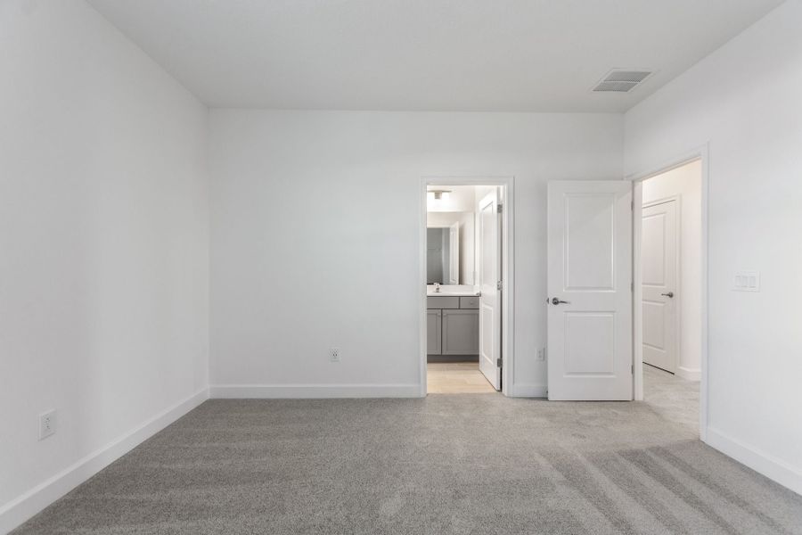 Representative unfurnished interior of a home built from the Oceanside by Park Square Residential in Paradiso Grande, Orlando (Image 27).