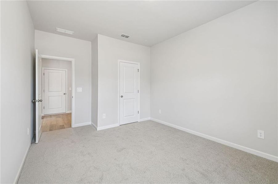 Spacious, unfurnished interior of a new home in Creekside at Oxford Park, Fairburn (Image 53).