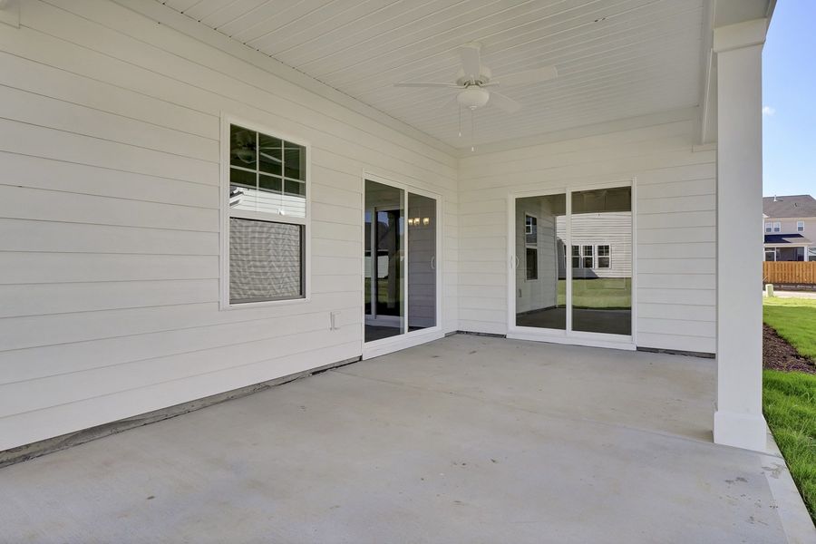 Exterior details and patio area of a home in Grand Park, Leland (Image 3).