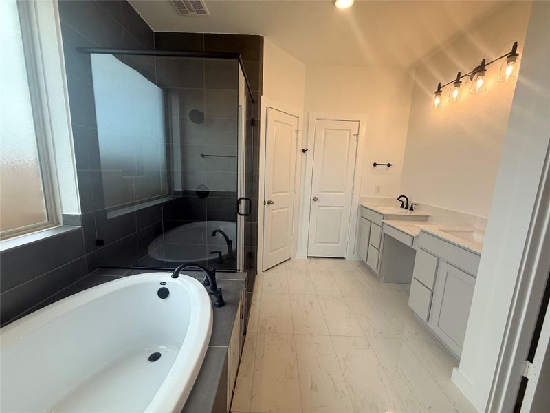 Relax in your beautifully designed main bathroom. Relax in your beautifully designed main bathroom.