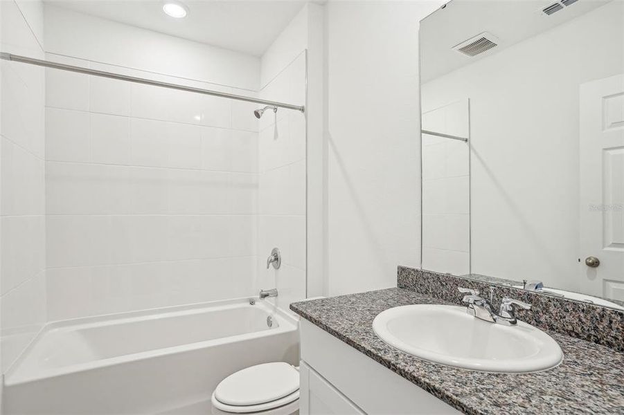 Furnished interior view inside a new home in Lake Deer Estates - Signature Series, Poinciana (Image 12). Furnished interior view inside a new home in Lake Deer Estates - Signature Series, Poinciana (Image 12).