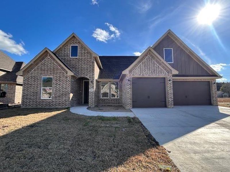 Front exterior of a new home in , Beaumont, TX, highlighting curb appeal (Image 2). Front exterior of a new home in , Beaumont, TX, highlighting curb appeal (Image 2).