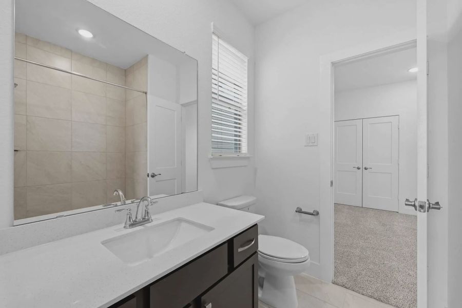 Representative furnished interior of a home built from the Cheverny by Chesmar Homes in Bridgeland Chateau, Cypress (Image 12).