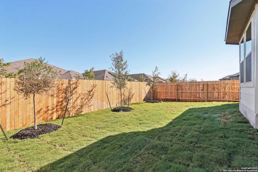 Exterior details and patio area of a home in Catalina, Converse (Image 25).