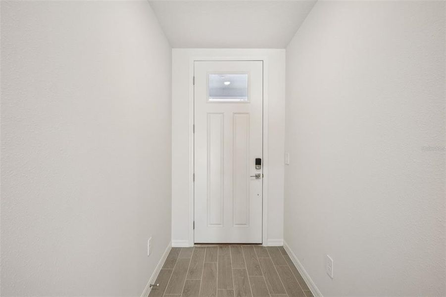 Spacious, unfurnished interior of a new home in The Grove at Stuart Crossing - Classic Series, Bartow (Image 18).