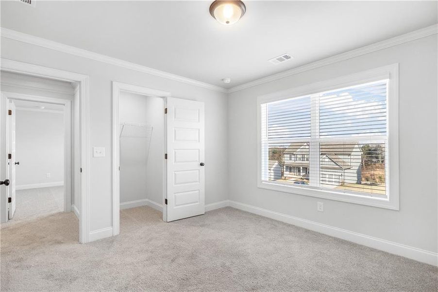 Spacious, unfurnished interior of a new home in Calgary Downs, Winder (Image 32).
