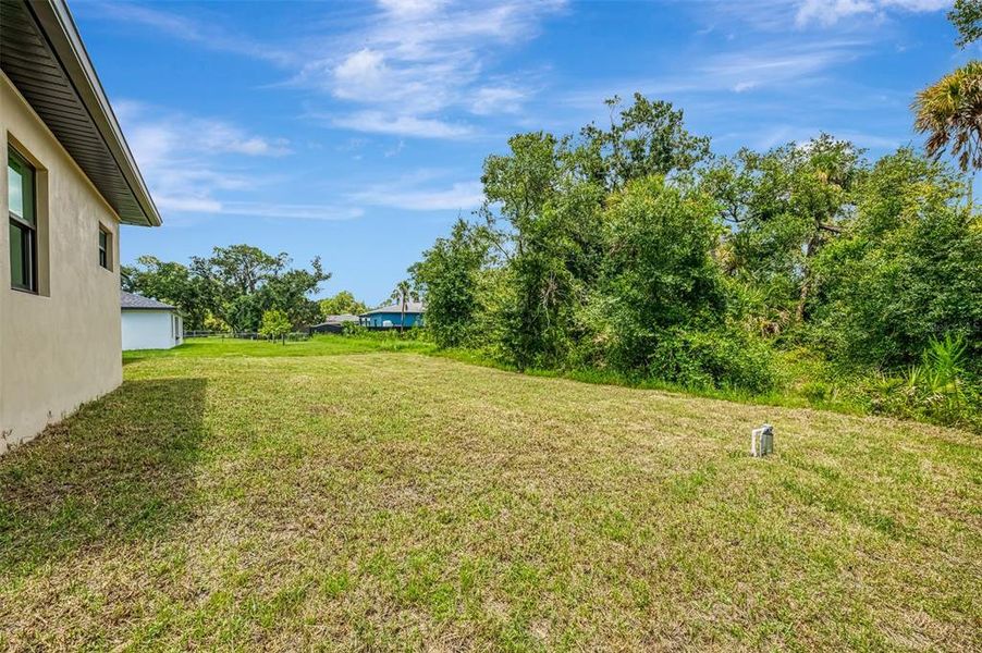 Front exterior of a new home in , Port Charlotte, FL, highlighting curb appeal (Image 40).