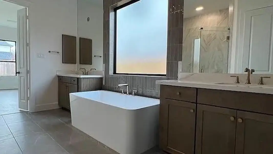 Furnished interior view inside a new home in Bridgeland 45', 50', 70', Cypress (Image 5).