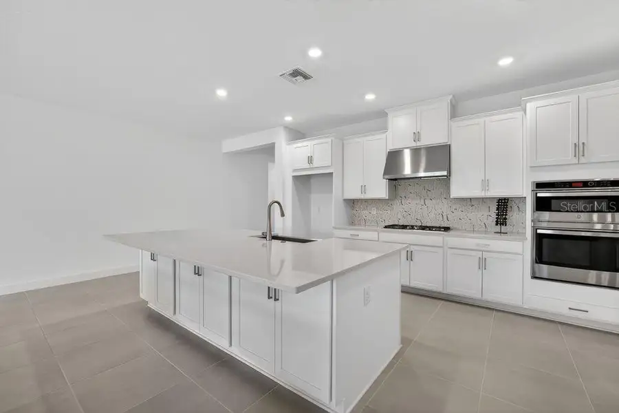 Furnished interior view inside a new home in Hammock at Two Rivers, Zephyrhills (Image 5).