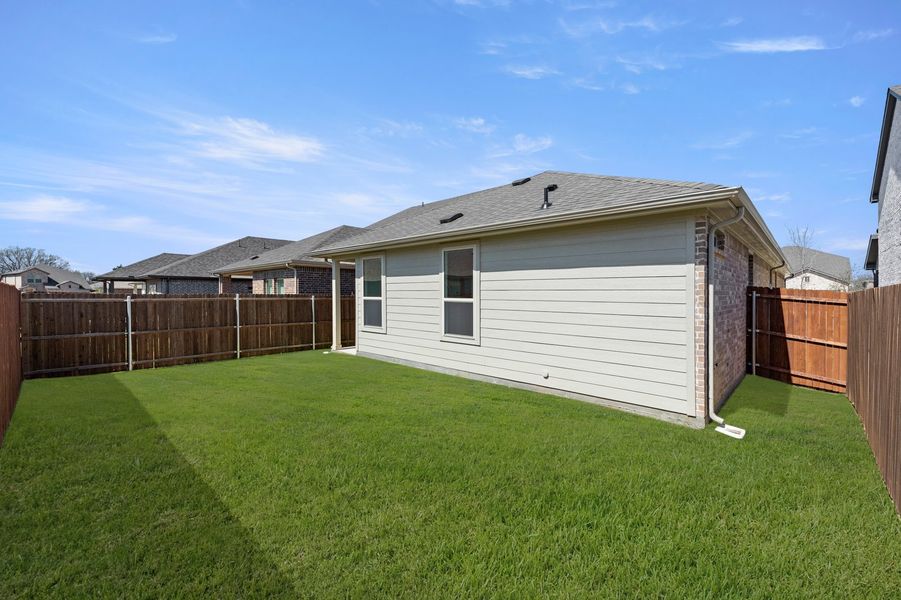 Front exterior of a new home in Bryant Farms, Melissa, TX, highlighting curb appeal (Image 27).