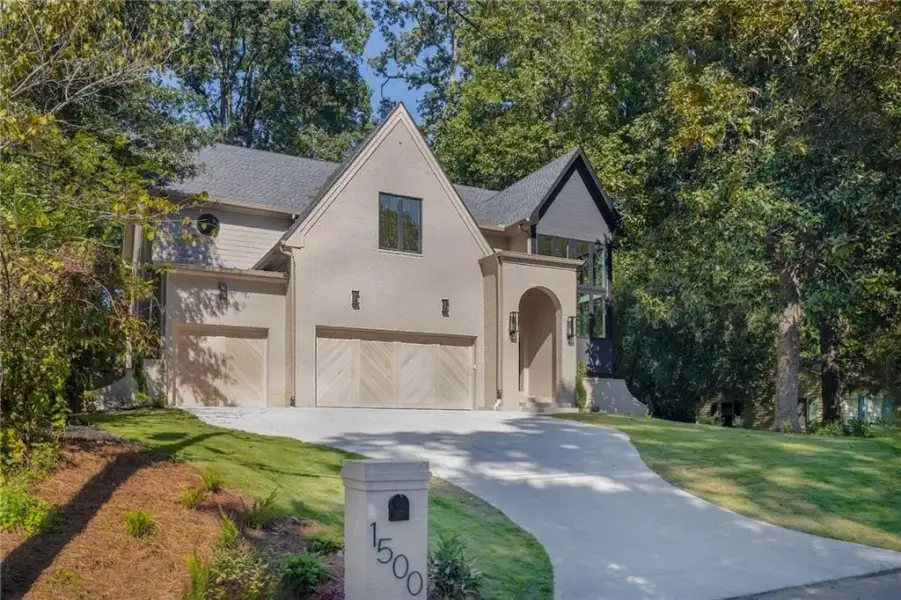 Front exterior of a new home in , Brookhaven, GA, highlighting curb appeal (Image 1). Front exterior of a new home in , Brookhaven, GA, highlighting curb appeal (Image 1).