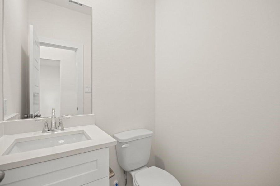 Furnished interior view inside a new home in Creekhaven, Iowa Colony (Image 5).