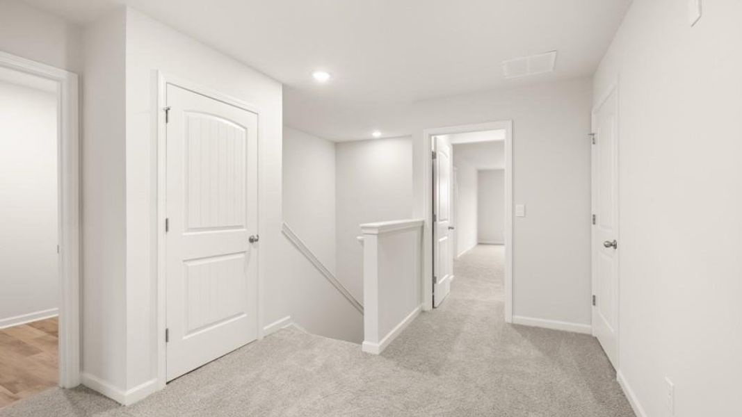 Spacious, unfurnished interior of a new home in Carlton, Douglasville (Image 12). Spacious, unfurnished interior of a new home in Carlton, Douglasville (Image 12).