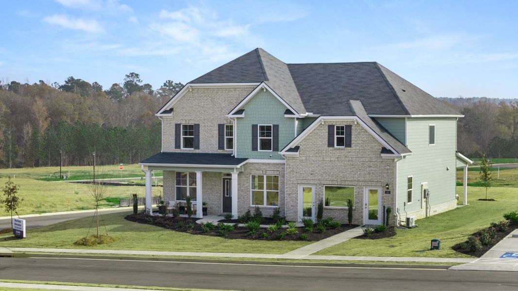 Representative exterior photo of a completed home built from the Savannah by D.R. Horton in Evergreen Crossing, Locust Grove, GA (Image 1).