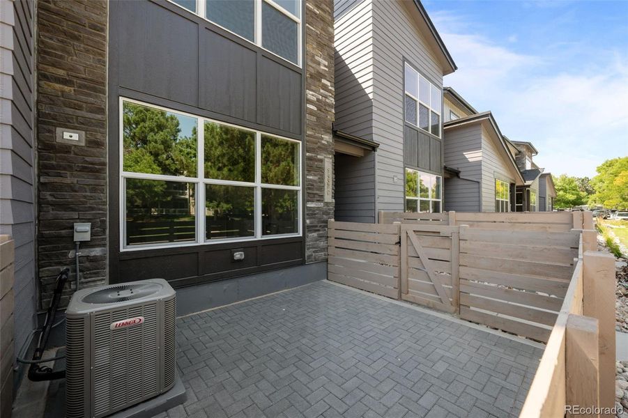 Exterior details and patio area of a home in Ralston Creek, Arvada (Image 21).