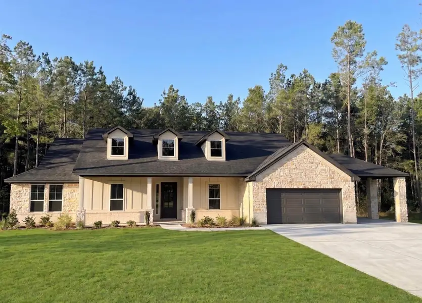 Front exterior of a home in the Deer Pines community, located in Conroe, TX (Image 3). Front exterior of a home in the Deer Pines community, located in Conroe, TX (Image 3).