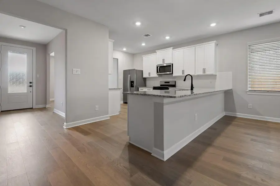 Furnished interior view inside a new home in Magnolia Woods, Magnolia (Image 2). Furnished interior view inside a new home in Magnolia Woods, Magnolia (Image 2).
