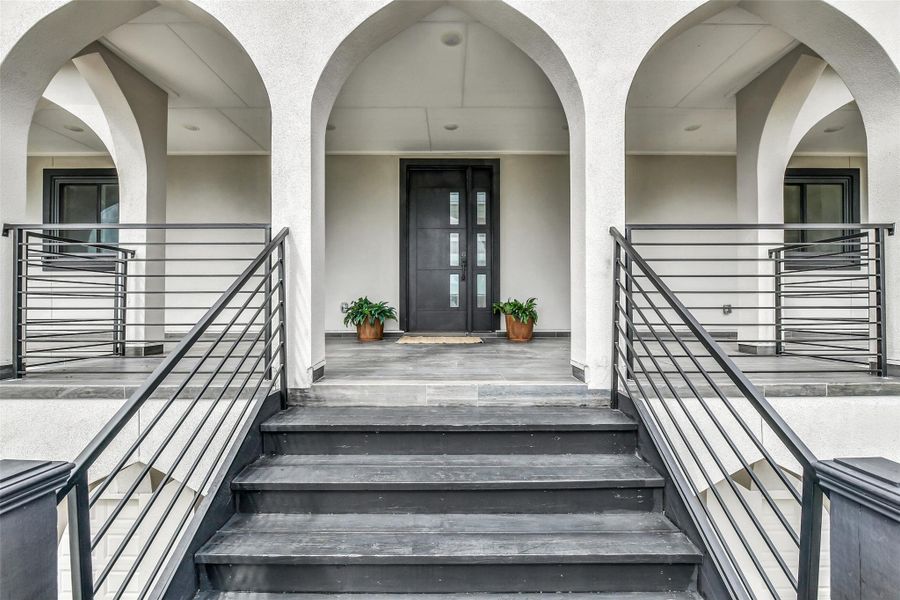 The grand staircase sets the tone for the entire home. Sculptural lines and open railings add architectural impact while preserving the bright, airy atmosphere. The grand staircase sets the tone for the entire home. Sculptural lines and open railings add architectural impact while preserving the bright, airy atmosphere.