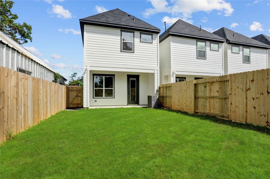 The huge back yard is fully fenced. The huge back yard is fully fenced.