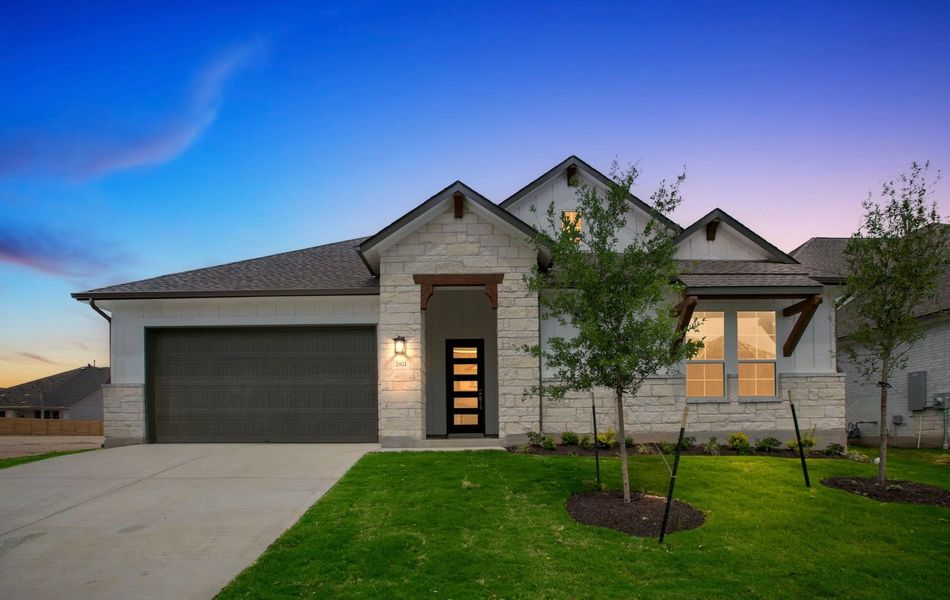 Representative exterior photo of a completed home built from the Harrison by GFO Home in Bluffview Reserve, Leander, TX (Image 29).
