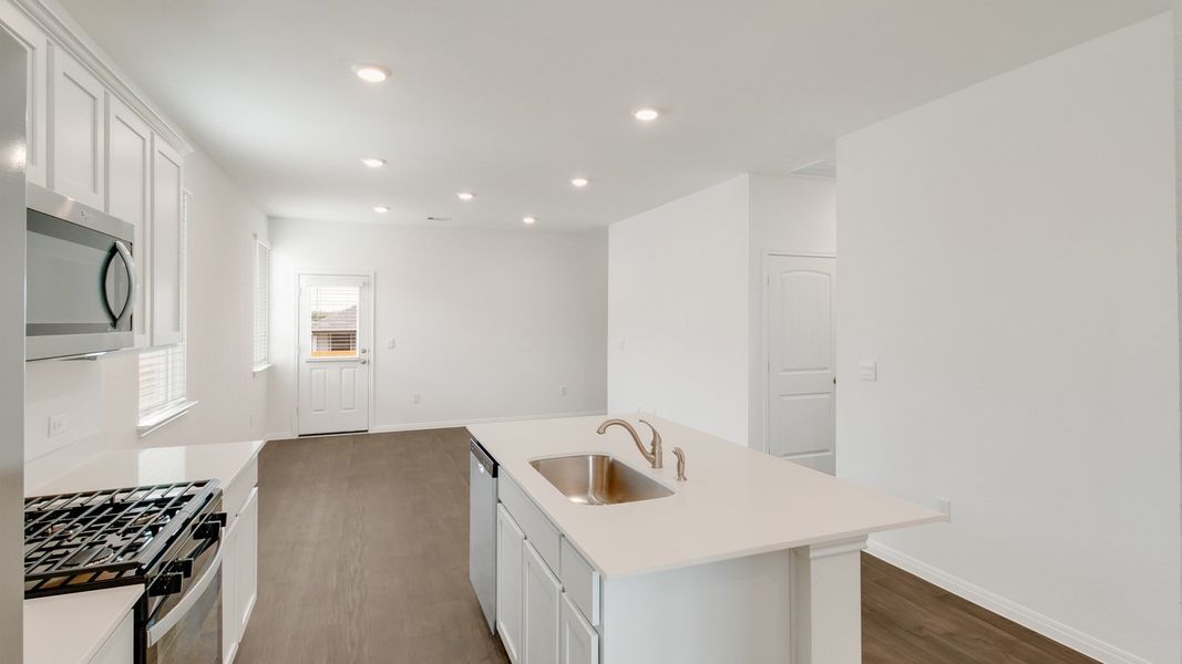 Representative furnished interior of a home built from the The Abbot by D.R. Horton in Talavera, Kyle (Image 3).