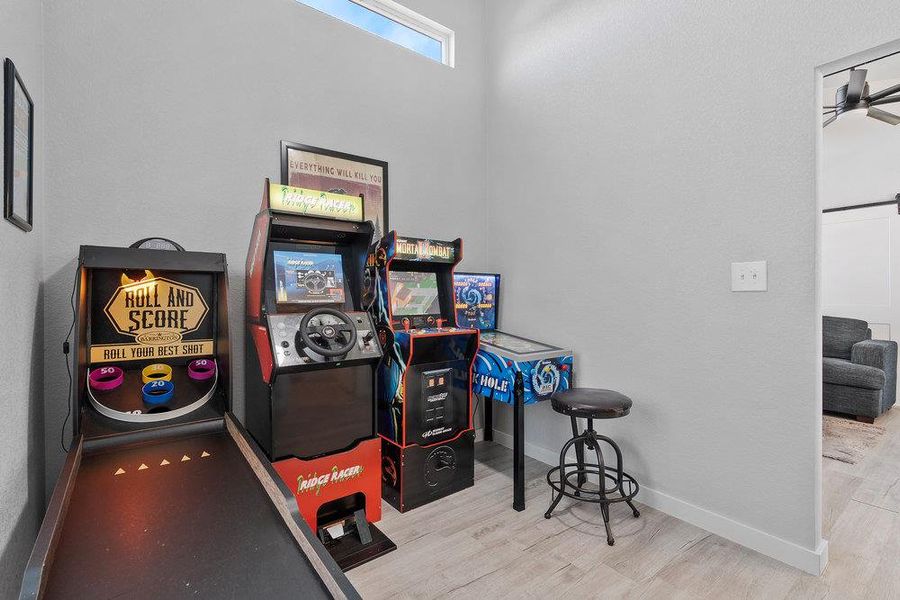 Flex room perfect as an office or game room featuring an AC wall unit