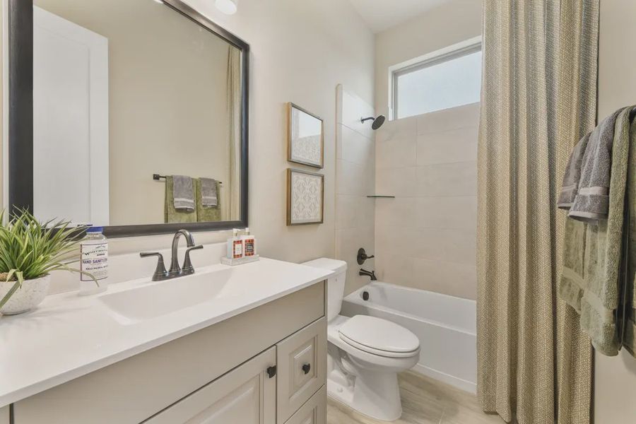 Representative furnished interior of a home built from the Lynnbrook by Chesmar Homes in The Trails, New Caney (Image 5).