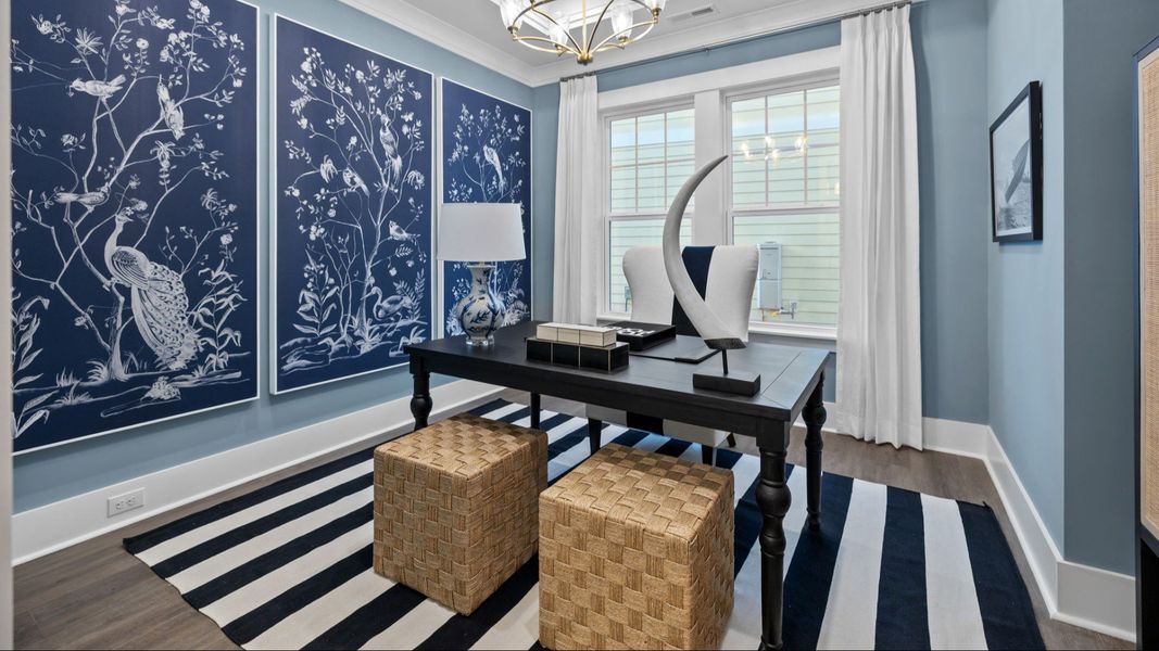 The Adventurer Plan by DBR Homes with a modern home office in Fort Mill, SC.