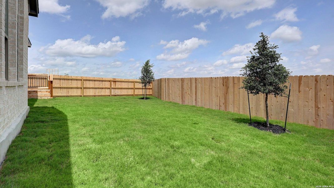 Exterior details and patio area of a home in Briggs Ranch, San Antonio (Image 25).