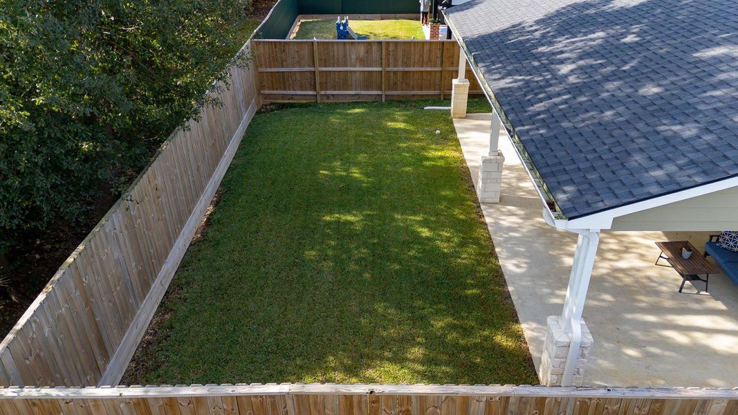Exterior details and patio area of a home in , Tomball (Image 3).