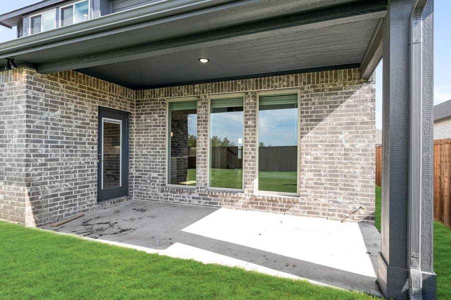 Exterior details and patio area of a home in Sonoma Verde, McLendon-Chisholm (Image 4).