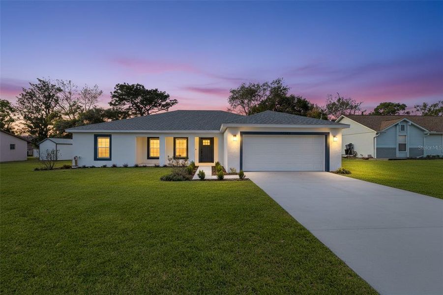 Front exterior of a new home in , Spring Hill, FL, highlighting curb appeal (Image 1). Front exterior of a new home in , Spring Hill, FL, highlighting curb appeal (Image 1).