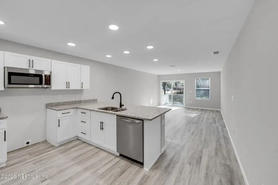 Furnished interior view inside a new home in , Jacksonville (Image 5). Furnished interior view inside a new home in , Jacksonville (Image 5).