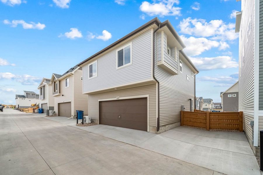 Exterior details and patio area of a home in Reunion, Commerce City (Image 21).